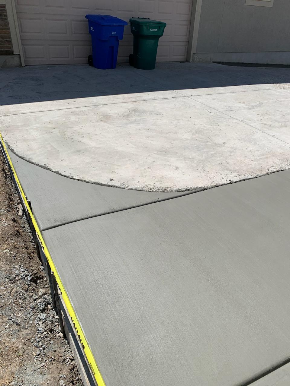 Concrete walkway by API Construction